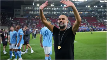 Pep Guardiola waves to the fans following the UEFA Super Cup 2023 match between Manchester City FC and Sevilla FC at Karaiskakis Stadium. Photo by Alex Caparros.