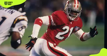 Deion Sanders (in red) in action during Super Bowl XXIX.