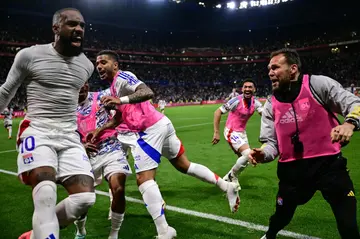 Alexandre Lacazette (L) was the hero with the winner as Lyon beat Strasbourg to secure European qualification