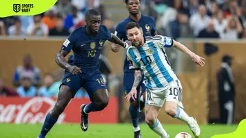 Lionel Messi and Dayot Upamecano during the 2022 FIFA World Cup 2022 final at Lusail Stadium