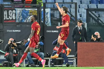 Slender margin: Edoardo Bove (right) gives Roma the lead in their Europa League semi-final