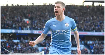 Kevin De Bruyne celebrates after scoring their side's first goal during the Premier League match between Manchester City and Manchester United at Etihad Stadium. Photo by Michael Regan.