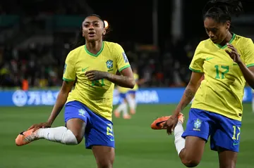 Ary Borges (R) celebrates her goal with Brazilian team-mate Kerolin