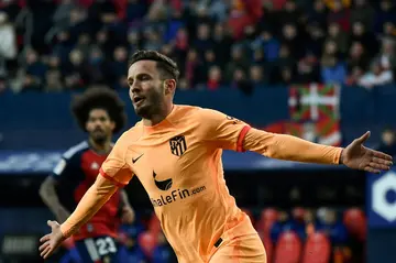 Atletico Madrid's Spanish midfielder Saul Niguez celebrates after scoring the winner against Osasuna