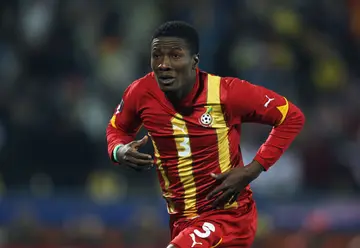 Asamoah Gyan of Ghana celebrates scoring his side's second goal during the 2010 FIFA World Cup South Africa Round of Sixteen match between USA and Ghana at Royal Bafokeng Stadium in Rustenburg