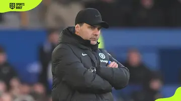 Pochettino observing the pitch during Chelsea's game against Everton