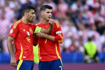 Rodri (left) has evolved into one of Spain's leaders, alongside captain Alvaro Morata (right)