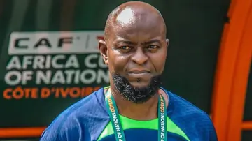Nigeria head coach, Finidi George, watching on in a past match. Photo: @yabaleftonline.