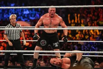 Brock Lesnar and The Undertaker battle it out at the WWE SummerSlam 2015 at Barclays Center of Brooklyn on August 23, 2015 in New York City. (Photo by JP Yim/Getty Images)