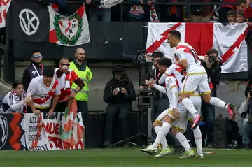 Rayo Vallecano's Spanish forward Raul de Tomas celebrates scoring his team's equaliser against Real Madrid from the spot