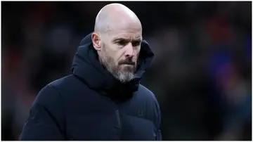 Erik ten Hag walks off at half time during the Premier League match between Manchester United and Tottenham Hotspur at Old Trafford. Photo by Alex Livesey.