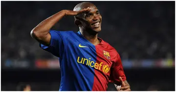 Samuel Eto'o salutes the crowd as he celebrates scoring his side's sixth goal during the La Liga match between Barcelona and Malaga at the Camp Nou. Photo by Jasper Juinen.
