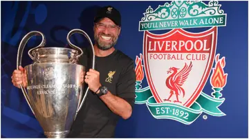 Jurgen Klopp holds the winners' trophy after the UEFA Champions League final between Tottenham Hotspur and Liverpool. Photo by Stuart Franklin.