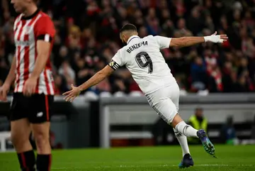 Real Madrid's French forward Karim Benzema celebrates after scoring against Athletic Bilbao