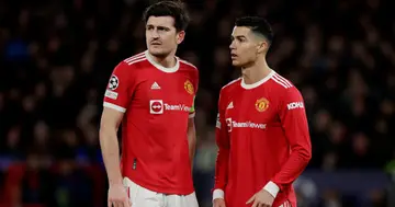 Harry Maguire and Cristiano Ronaldo during the UEFA Champions League match between Manchester United v Atletico Madrid at the Old Trafford on March 15, 2022 in Manchester United Kingdom (Photo by David S. Bustamante/Soccrates/Getty Images)