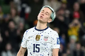 Megan Rapinoe reacts after missing her penalty for the USA in their shoot-out defeat against Sweden