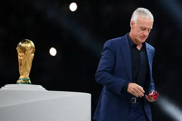 France coach Didier Deschamps walks past the World Cup trophy following the defeat to Argentina in the final