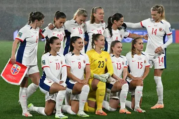 Ada Hegerberg, wearing the number 14, lined up with her Norway teammates before kick-off in their game against Switzerland, before promptly heading back down the tunnel