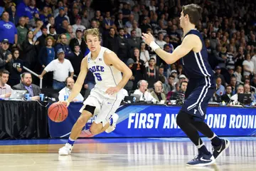 Luke Kennard (5) of the Duke Blue Devils dribbles the ball against the Yale Bulldogs at Dunkin' Donuts Center on March 19, 2016, in Providence, Rhode Island