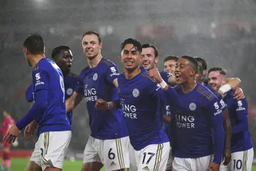 Leicester City players are seen celebrating
