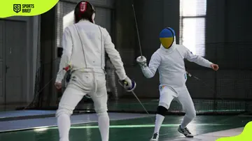 Pavlo Trofymenko and Igor Reizlin compete in a fencing match