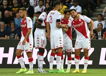 Kevin Volland (R) put Monaco in front against PSG before having to come off injured