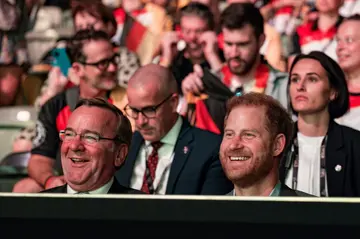 Britain's Prince Harry, Duke of Sussex (R) and German defence minister Boris Pistorius (L) share a laugh during the opening ceremony of the 2023 Invictus Games at the Merkur Spielarena in Duesseldorf, western Germany on September 9, 2023.