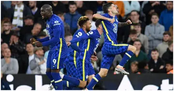 Christian Pulisic celebrates with teammates after scoring their second goal during the English Premier League football match between Leeds United and Chelsea at Elland Road. Photo by Oli SCARFF.