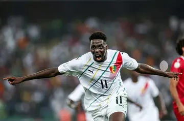Mohamed Bayo celebrates after scoring Guinea's dramatic late winner against Equatorial Guinea