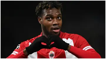 Royal Antwerp's George Ilenikhena celebrates scoring against Barcelona in their UEFA Champions League game at Bosuilstadion on December 13, 2023, in Antwerpen, Belgium.