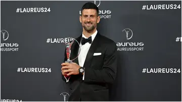 Novak Djokovic poses for a photo with the Laureus Sportsman of the Year Award during the 2024 Laureus World Sports Awards Madrid at Palacio De Cibeles. Photo by Burak Akbulut.