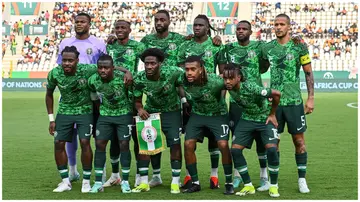 Super Eagles players were spotting struggling with the new national anthem lyrics before the World Cup qualifiers against South Africa in Uyo. Photo: Issouf Sanogo.