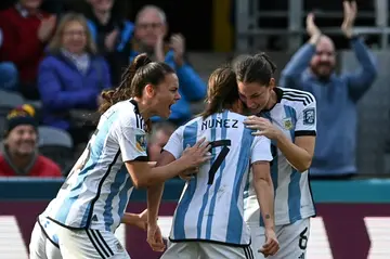 Argentina players celebrate after Romina Nunez scored their equaliser against South Africa in Dunedin