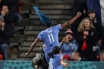 Diani celebrates scoring against Morocco in the last 16 in Adelaide