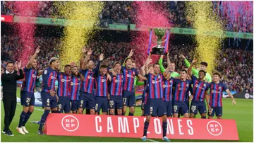 Barcelona players celebrate after winning the Spanish trophy at the end of the Spanish league football match between FC Barcelona vs Real Sociedad at Camp Nou. Photo by Adria Puig.