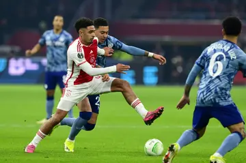 Tristan Gooijer (L) and Morgen Rogers battle for possession in Ajax and Aston Villa's a 0-0 draw in Amsterdam
