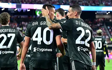 Juventus' forward Angel Di Maria celebrates with goalscorer Marco Da Graca in a 2-0 friendly win over Chivas Guadalajara in Las Vegas, Nevada