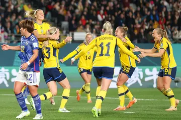 Sweden players celebrate after Amanda Ilestedt put them in front against Japan