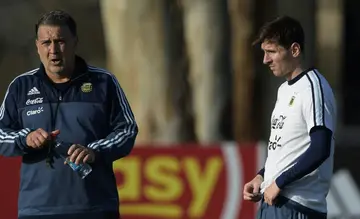 Inter Miami have appointed Gerardo Martino (L) as their new coach ahead of the arrival of Lionel Messi (R)