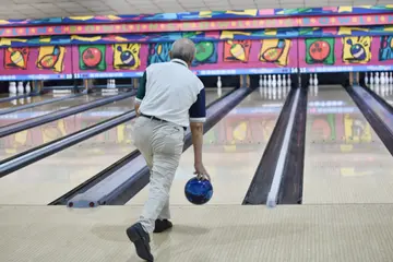 How to get a strike in bowling?