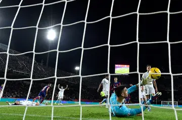 Barcelona's German midfielder Ilkay Gundogan (L) pulled his team back into the game but they could not find an equaliser