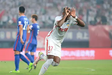 Anthony Modeste scores past Chongqing Dangdai Lifan