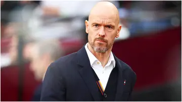 Erik ten Hag looks on prior to the Premier League match between West Ham United and Manchester United at London Stadium. Photo by Clive Rose.