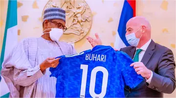President Buhari Receives Customized Shirt From FIFA President Gianni Infantino