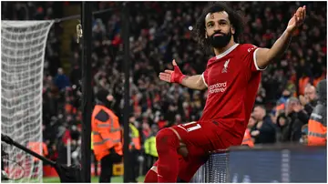 Mohamed Salah celebrates after scoring during the Premier League match between Liverpool FC and Newcastle United at Anfield. Photo by John Powell.
