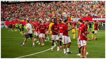 Manchester United stars walk off the pitch after the pre-season friendly between Arsenal and Manchester United at MetLife Stadium. Photo by Ash Donelon.