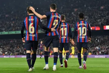 Barcelona's Polish forward Robert Lewandowski celebrates after scoring against Cadiz