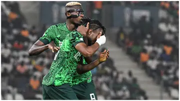Ademola Lookman and Victor Osimhen react during the Africa Cup of Nations 2023 semi-final football match between Nigeria and South Africa on February 7. Photo: Issouf Sanogo.