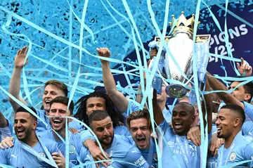 Manchester City celebrate winning the 2022 Premier League