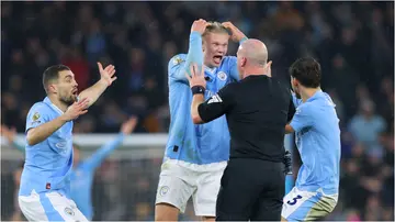Erling Haaland shouts at Simon Hooper after the referee denied Manchester City a chance to win against Tottenham Hotspur on December 3, 2023.